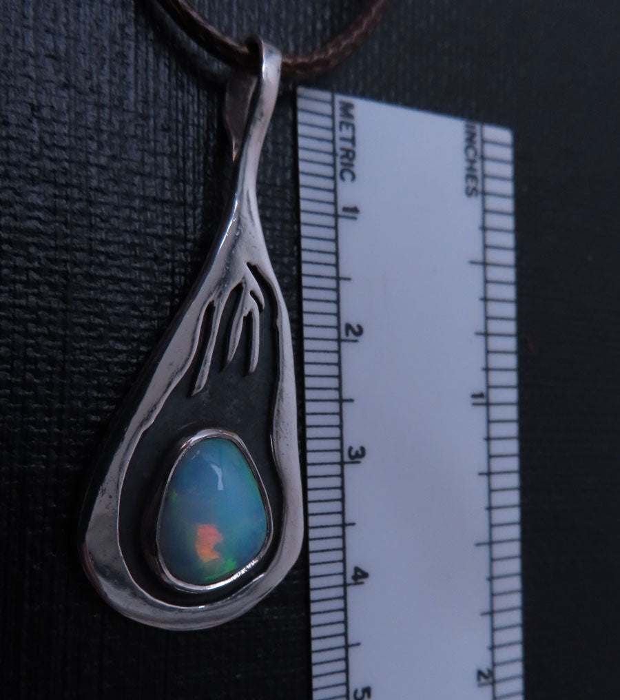 Silver Pendant with Flame Design & Ethiopian Opal