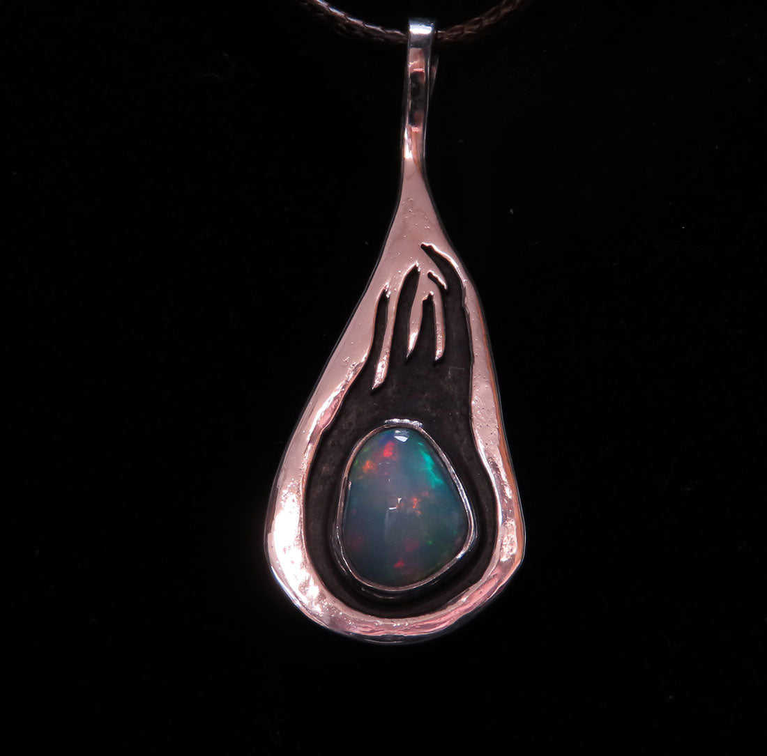 Silver Pendant with Flame Design & Ethiopian Opal